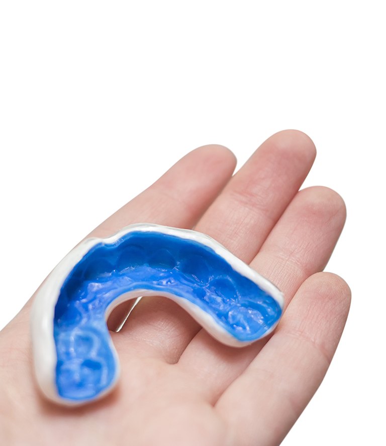 child holding mouthguard