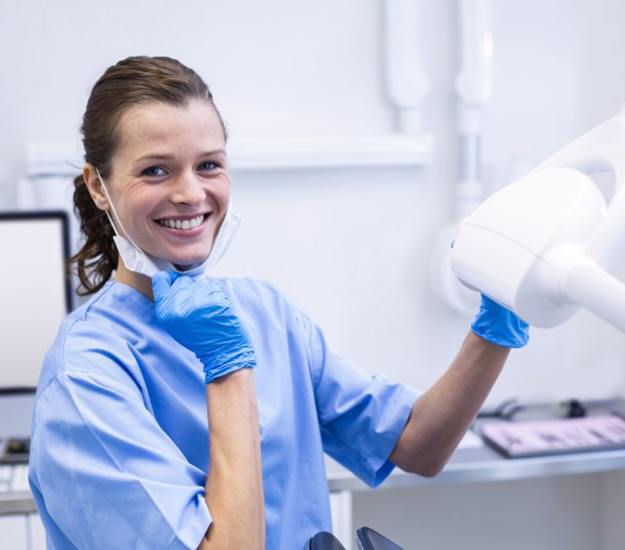 Dental hygienist smiles