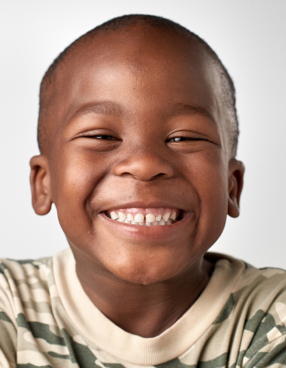 closeup of young child smiling 