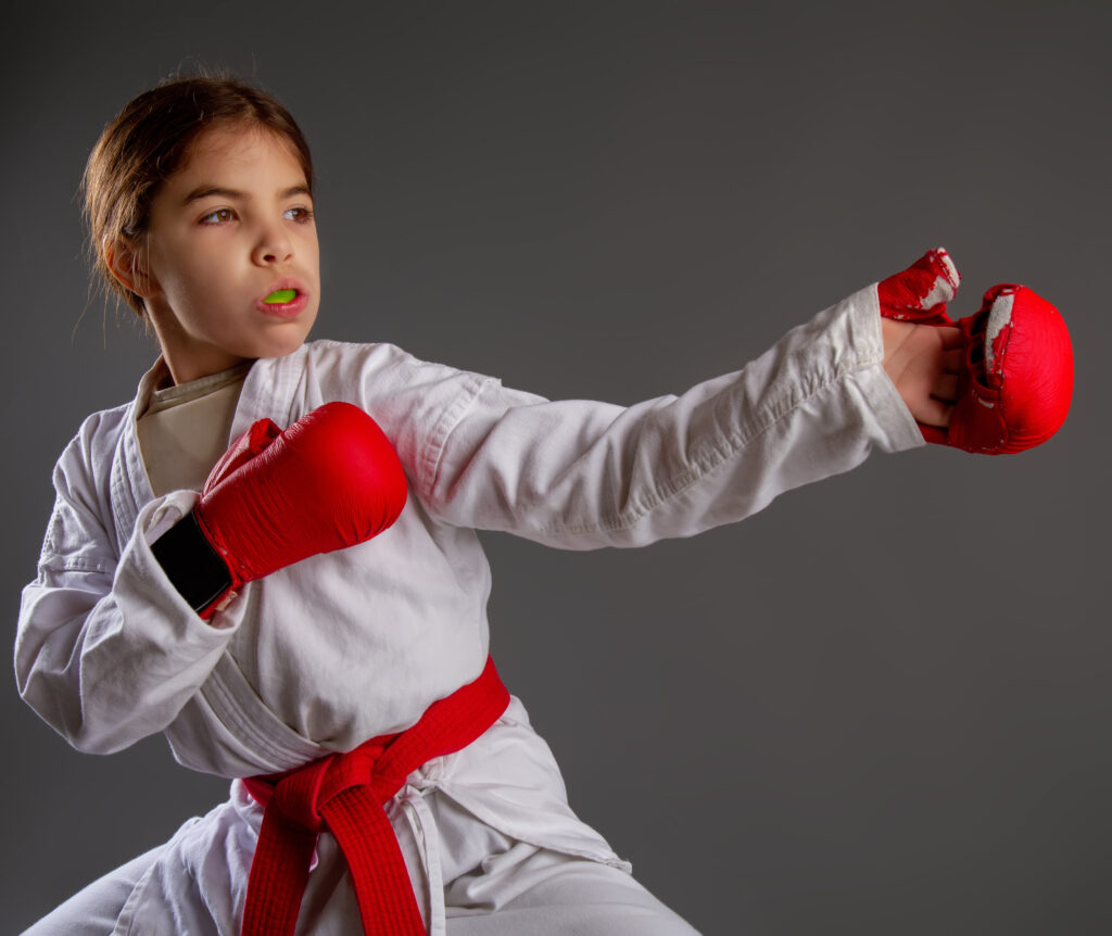 young girl practicing karate 